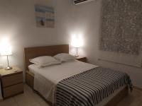 Postel nebo postele na pokoji v ubytování Nefeli Villas