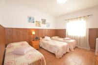 Posteľ alebo postele v izbe v ubytovaní Habitaciones Baleares