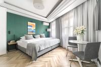 Łóżko lub łóżka w pokoju w obiekcie City Apartments - Apartamenty Butikowe