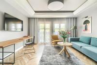 Telewizja i/lub zestaw kina domowego w obiekcie City Apartments - Apartamenty Butikowe