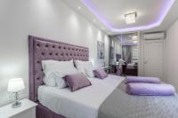 Postel nebo postele na pokoji v ubytování Luxury suite Elysium