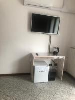 Televízia a/alebo spoločenská miestnosť v ubytovaní La Casa di Anna
