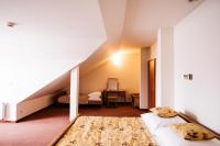 Posteľ alebo postele v izbe v ubytovaní Hotel Chata Za Wsią
