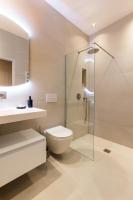 a bathroom with a toilet and a glass shower at CMG BASTILLE &#47; GARE DE LYON 2 in Paris