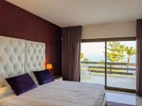 Postel nebo postele na pokoji v ubytování Coral Beach Aparthotel