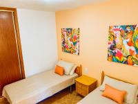 Postel nebo postele na pokoji v ubytování Zafiro Apartments