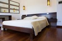 Łóżko lub łóżka w pokoju w obiekcie Hotel Le Piane