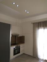 Kuchyň nebo kuchyňský kout v ubytování NAFPAKTOS Beach luxury Suites
