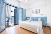 Posteľ alebo postele v izbe v ubytovaní Saronis Hotel Agistri - Adults Only