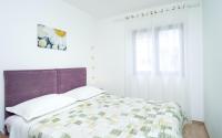 Posteľ alebo postele v izbe v ubytovaní Apartments Zlata