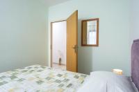 Posteľ alebo postele v izbe v ubytovaní Apartments Zlata