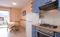 Kuchyňa alebo kuchynka v ubytovaní Apartments Zlata