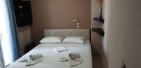 Posteľ alebo postele v izbe v ubytovaní Alkyonis hotel