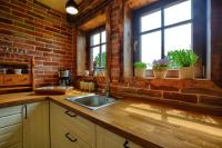 Kuchnia lub aneks kuchenny w obiekcie Herbarium Bieszczadzkie Apartamenty