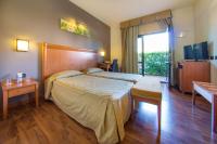 Posteľ alebo postele v izbe v ubytovaní Hotel Regio
