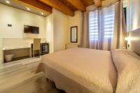 Posteľ alebo postele v izbe v ubytovaní Hotel Regio
