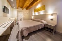 Posteľ alebo postele v izbe v ubytovaní Hotel Regio