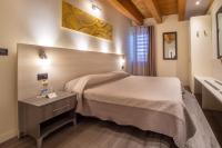 Posteľ alebo postele v izbe v ubytovaní Hotel Regio