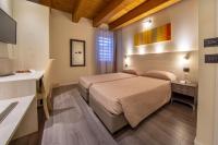 Posteľ alebo postele v izbe v ubytovaní Hotel Regio