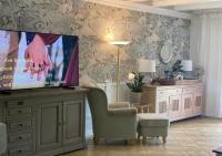TV a/nebo společenská místnost v ubytování Rowy Luxury
