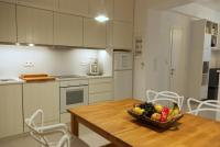 Kuchyňa alebo kuchynka v ubytovaní White cycladic town house with sea vew