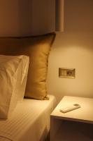 Postel nebo postele na pokoji v ubytování Polymnia Luxury Apartments Argostoli