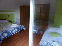Posteľ alebo postele v izbe v ubytovaní House Plitvice