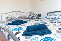 Postel nebo postele na pokoji v ubytování Apartman Maria