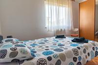 Postel nebo postele na pokoji v ubytování Apartman Maria