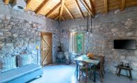 Telewizja i/lub zestaw kina domowego w obiekcie Boutique Stone Cottage