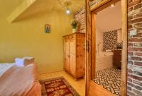 Łóżko lub łóżka w pokoju w obiekcie Herbarium Bieszczadzkie Apartamenty