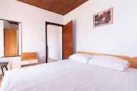 Posteľ alebo postele v izbe v ubytovaní Apartment Kukljica 3
