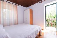 Posteľ alebo postele v izbe v ubytovaní Apartment Kukljica 3