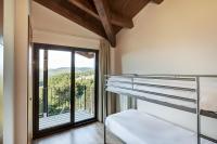 A bed or beds in a room at Apartamentos Masella 1600