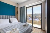 Sapphire Blue Suitesにあるベッド