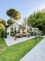 Vonkajšia záhrada v ubytovaní Hotel Hambros - Il Parco in Villa Banchieri