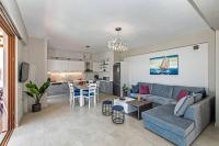 Posedenie v ubytovaní Villa Anthi, a modern villa with salted water pool,hot tub & BBQ!