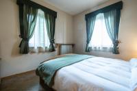 Łóżko lub łóżka w pokoju w obiekcie Marangon Apartments