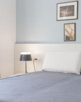 Posteľ alebo postele v izbe v ubytovaní J Rooms