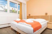 Posteľ alebo postele v izbe v ubytovaní Apartments Favoriten