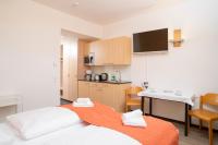 Posteľ alebo postele v izbe v ubytovaní Apartments Favoriten