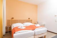 Posteľ alebo postele v izbe v ubytovaní Apartments Favoriten