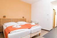 Posteľ alebo postele v izbe v ubytovaní Apartments Favoriten