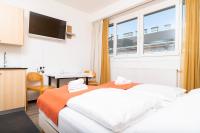 Posteľ alebo postele v izbe v ubytovaní Apartments Favoriten