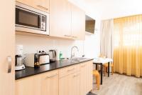Kuchyňa alebo kuchynka v ubytovaní Apartments Favoriten