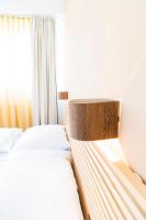 Posteľ alebo postele v izbe v ubytovaní Apartments Favoriten