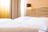 Posteľ alebo postele v izbe v ubytovaní Apartments Favoriten