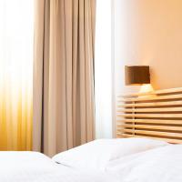 Posteľ alebo postele v izbe v ubytovaní Apartments Favoriten