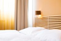 Posteľ alebo postele v izbe v ubytovaní Apartments Favoriten