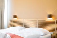 Posteľ alebo postele v izbe v ubytovaní Apartments Favoriten